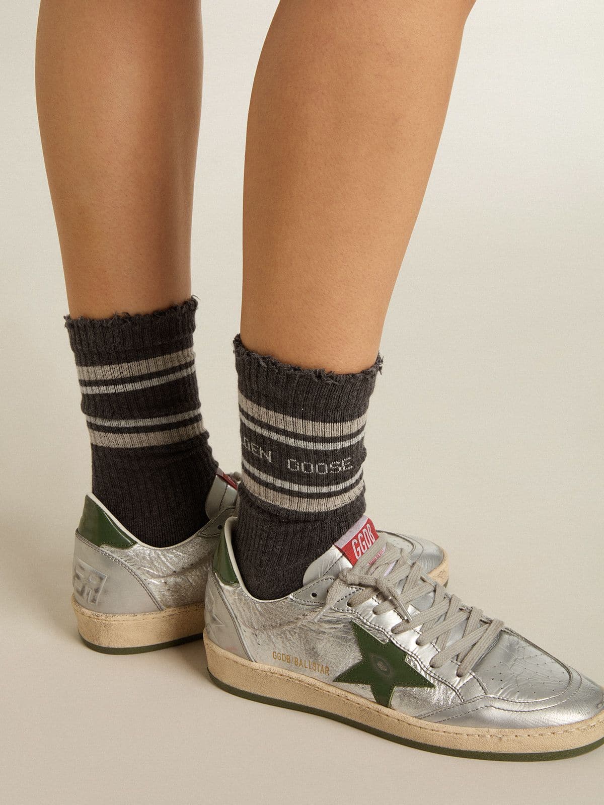 Dark grey socks with distressed details and cream and worn-white stripes - Golden Goose Women|Men
