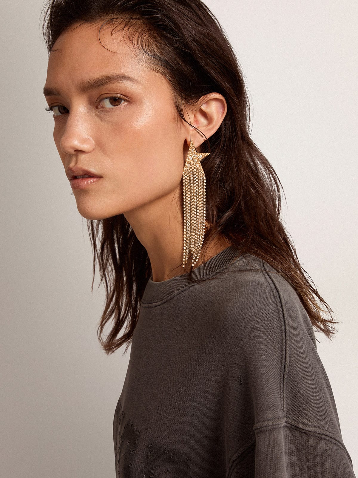 Women's single drop earring in antique gold color with decorative crystals - Golden Goose Women
