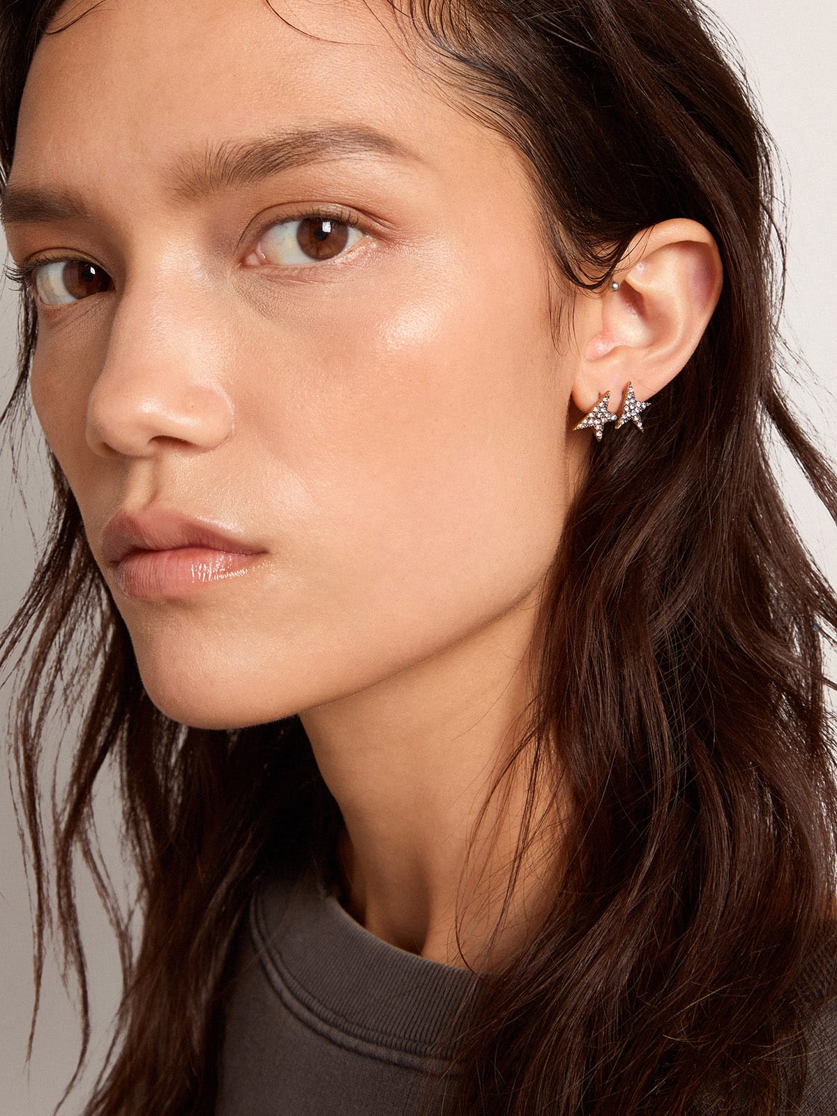 Women's stud earrings in antique gold color with crystals - Golden Goose Women