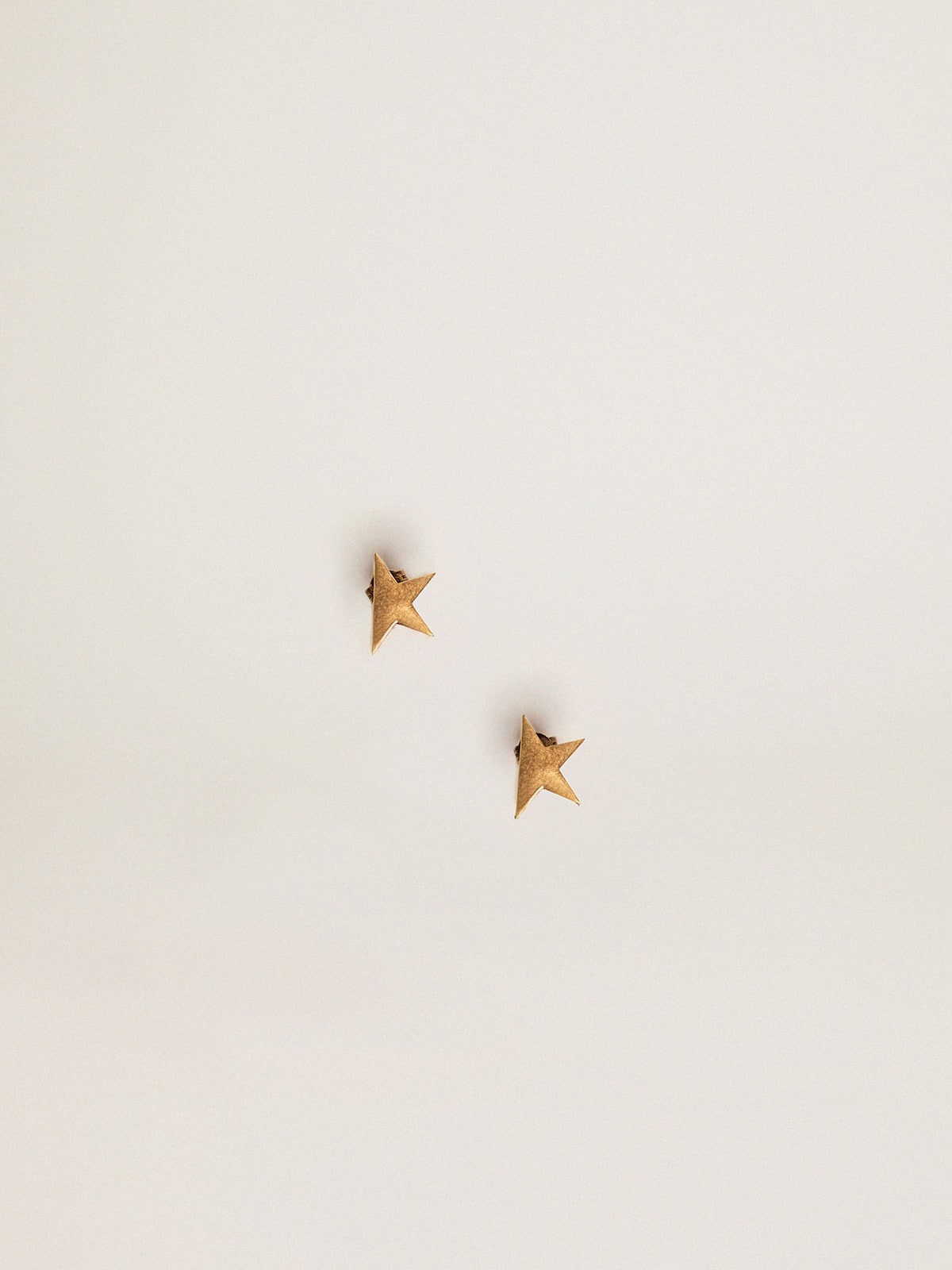 Women's stud earrings in antique gold color - Golden Goose Women