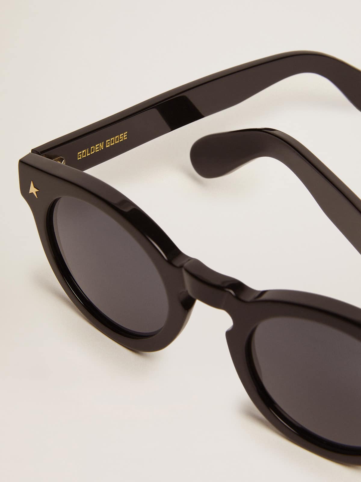 Sunframe Panthos model with black frame and gold details - Golden Goose Women|Men