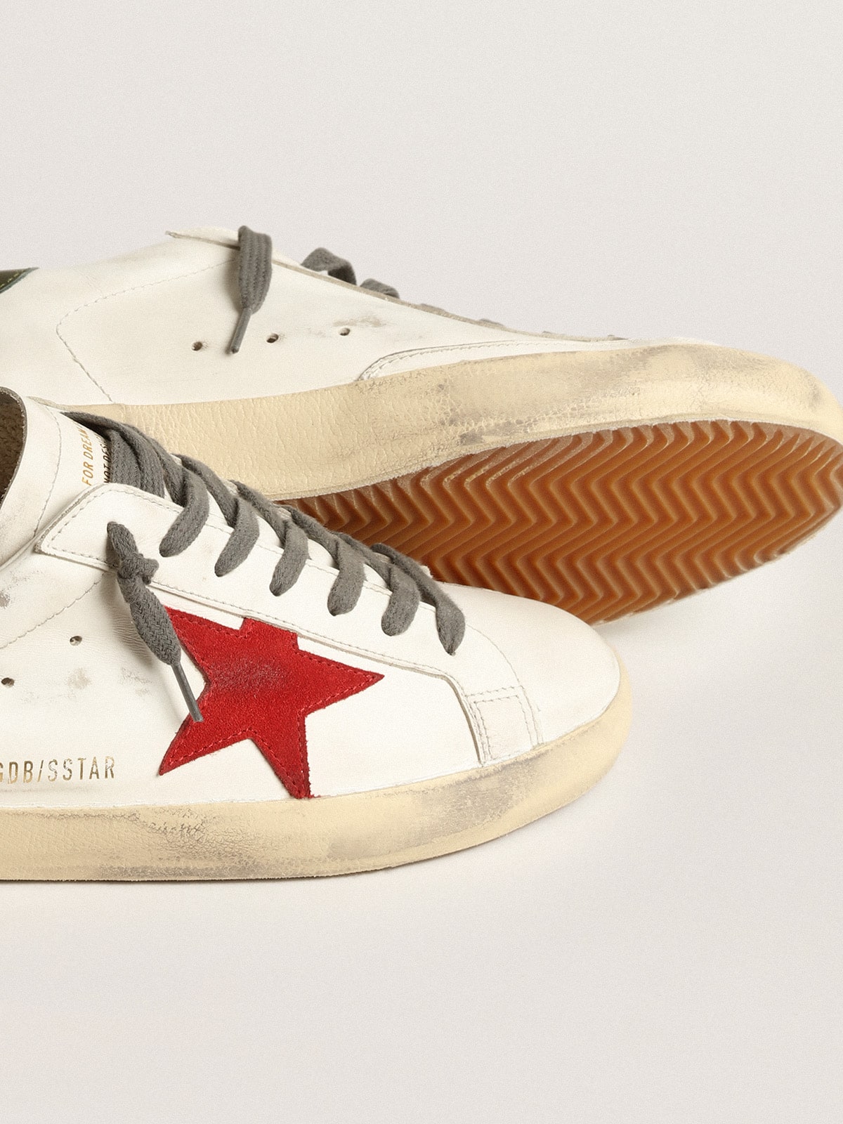 Men's Super-Star with red suede star and green leather heel tab - Golden Goose Men