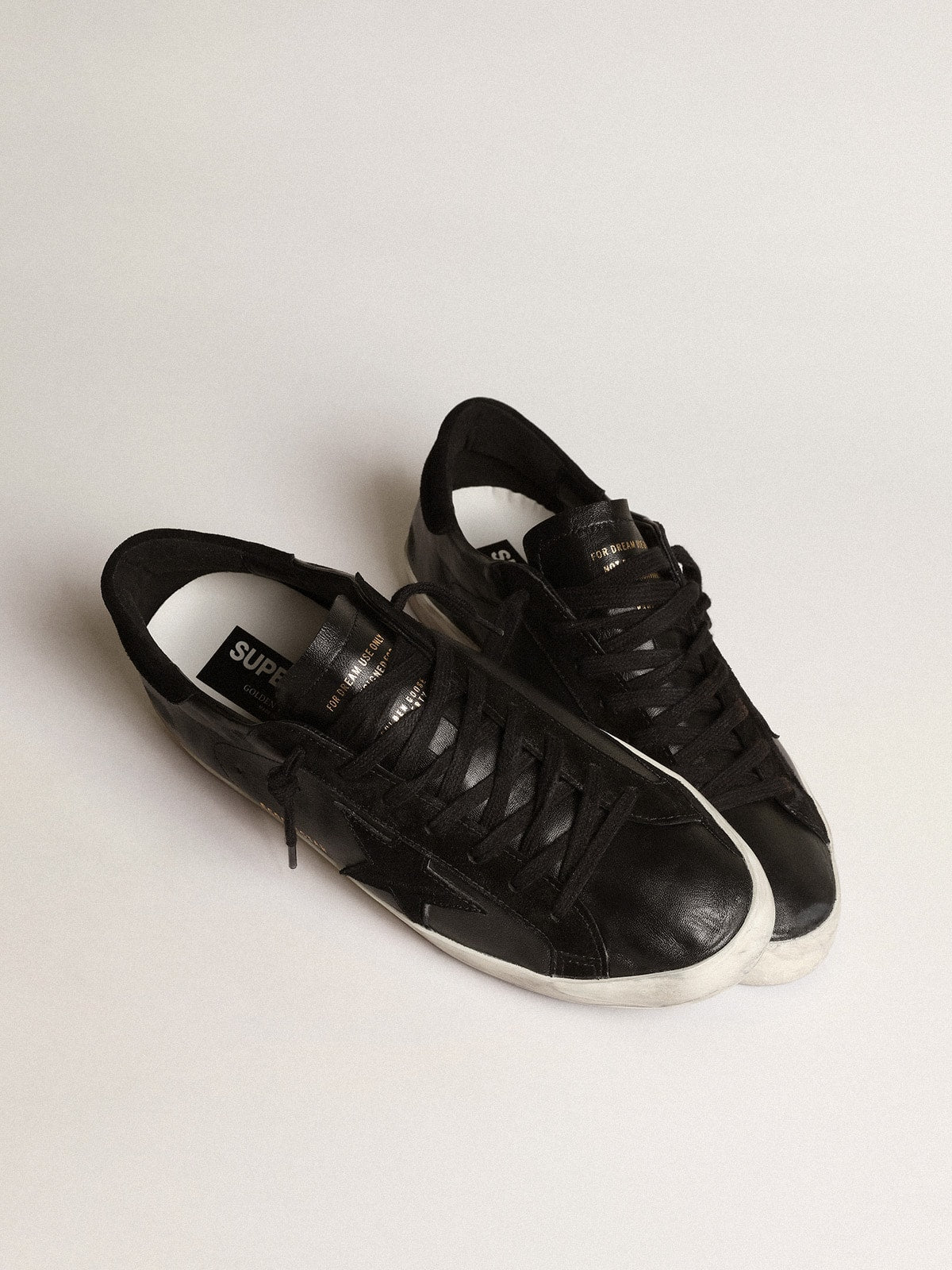 Men's Super-Star in black nappa with black suede star and heel tab - Golden Goose Men