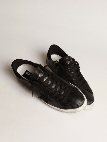 Men's Super-Star in black nappa with black suede star and heel tab - Golden Goose Men