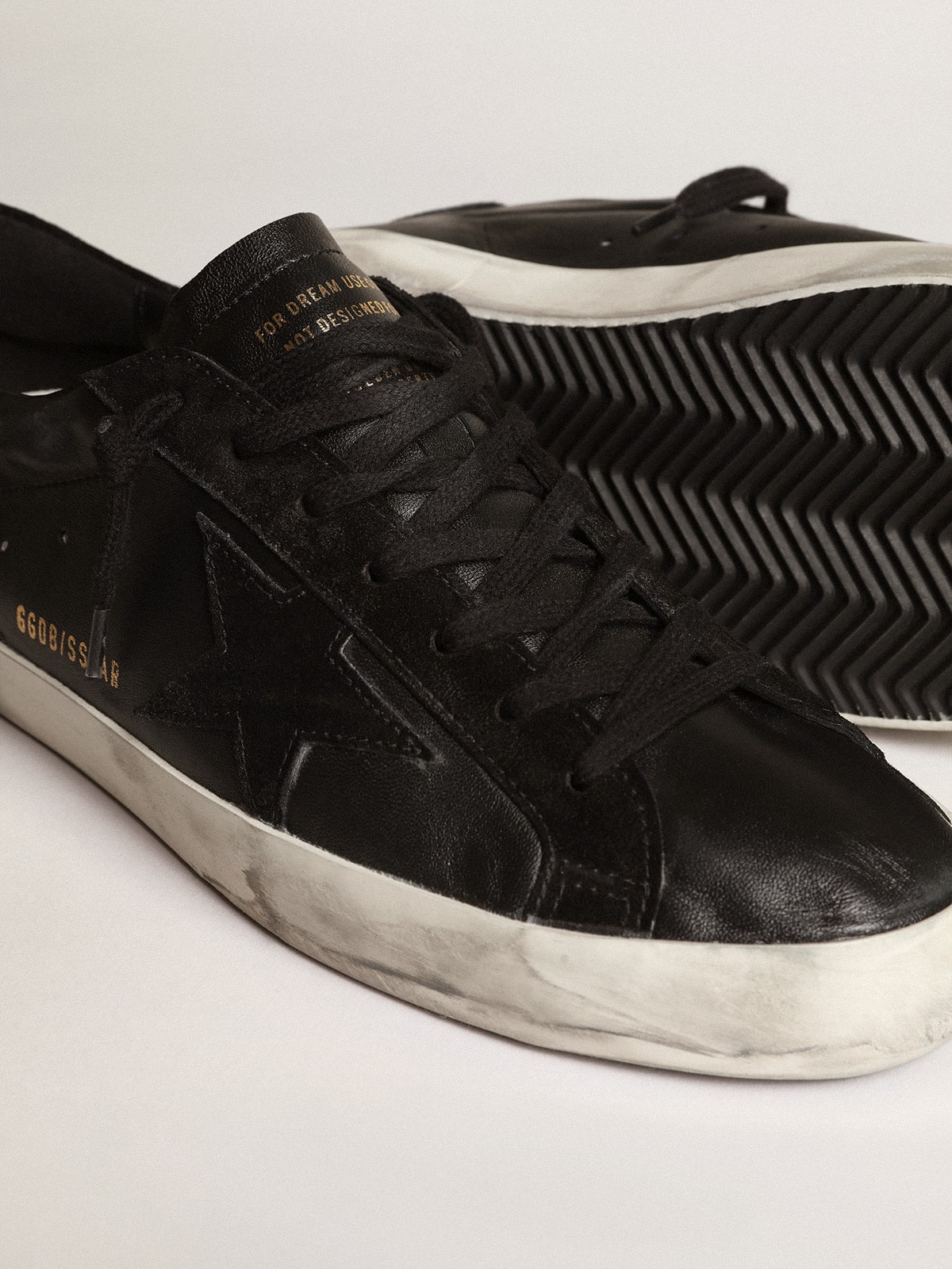 Men's Super-Star in black nappa with black suede star and heel tab - Golden Goose Men