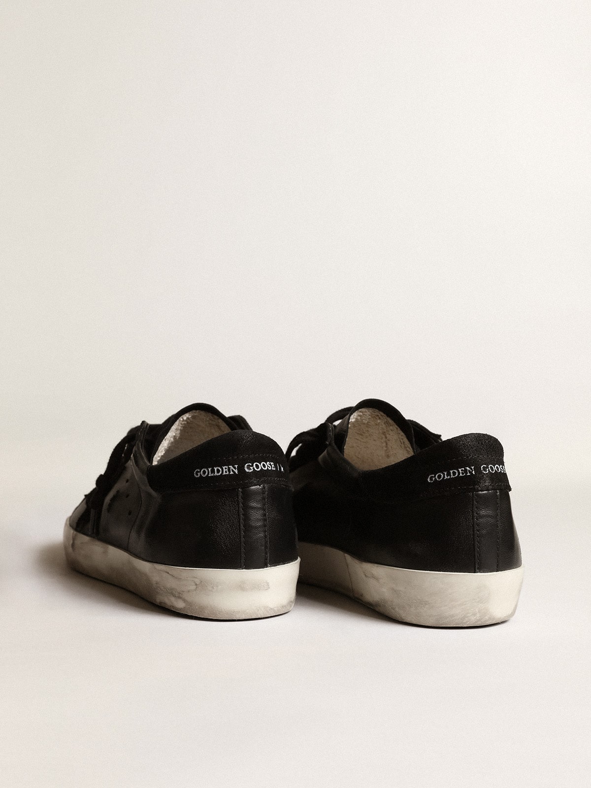 Men's Super-Star in black nappa with black suede star and heel tab - Golden Goose Men