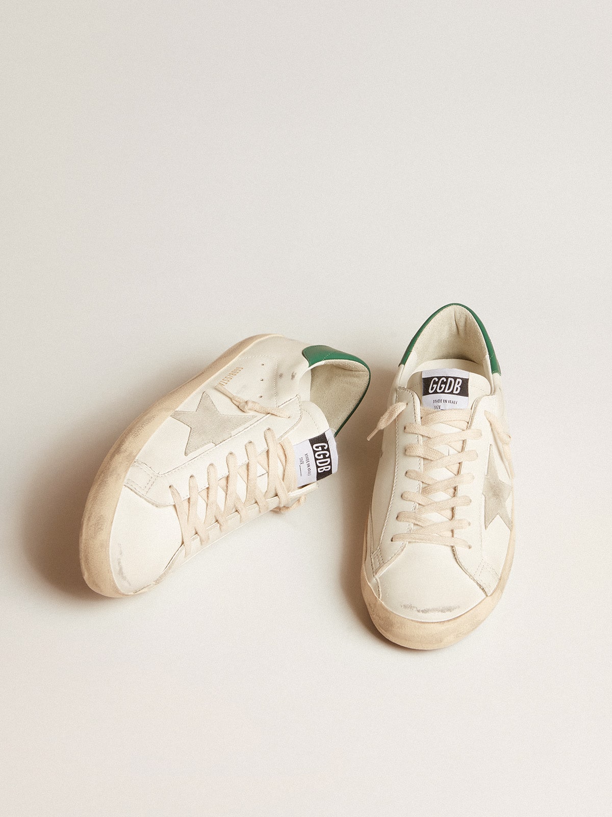 Super-Star in white leather with ice-gray suede star and green leather heel tab - Golden Goose Men