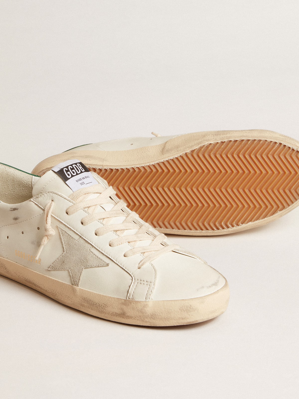 Super-Star in white leather with ice-gray suede star and green leather heel tab - Golden Goose Men