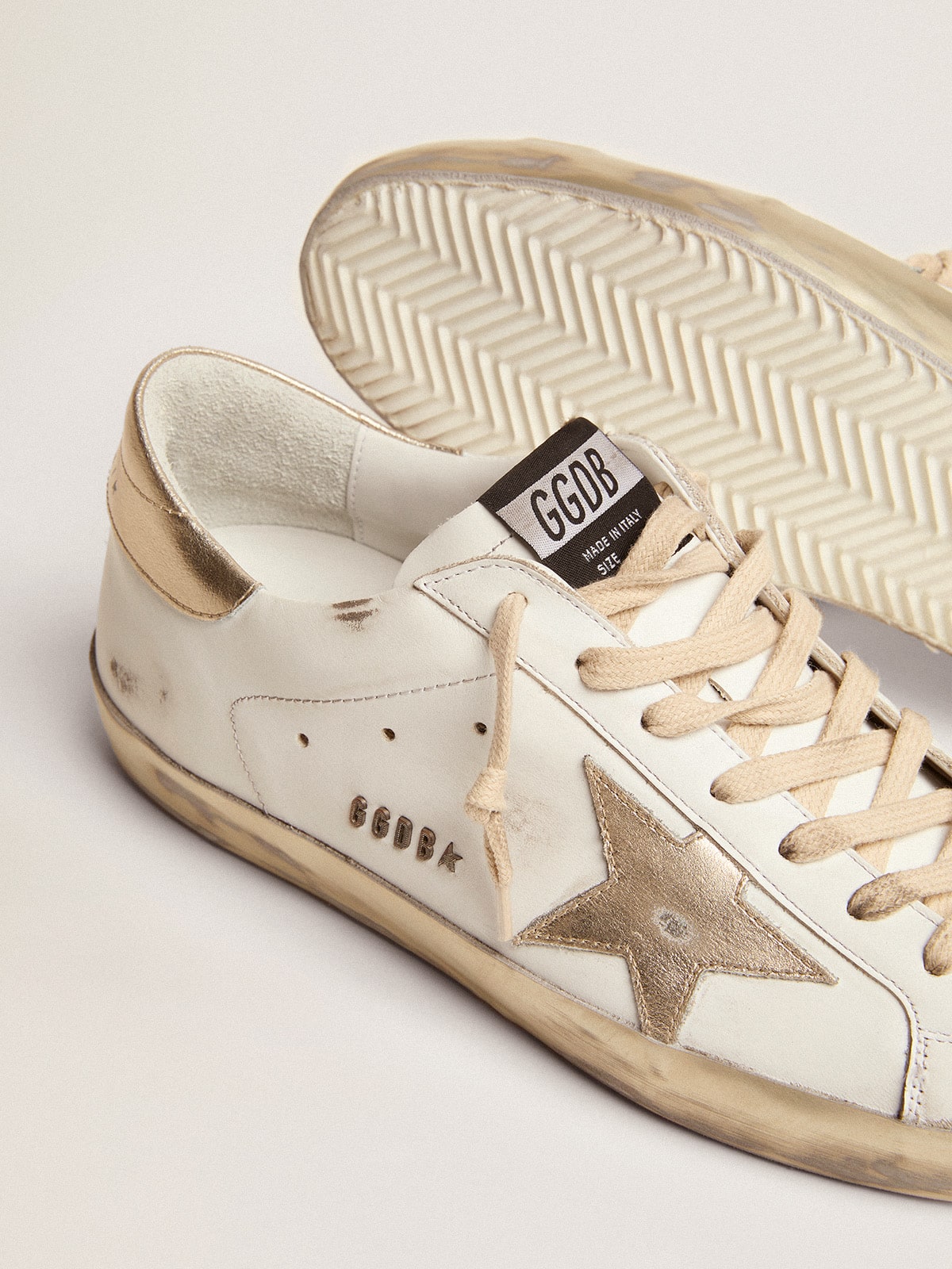Men's Super-Star with gold sparkle foxing and lettering - Golden Goose Men