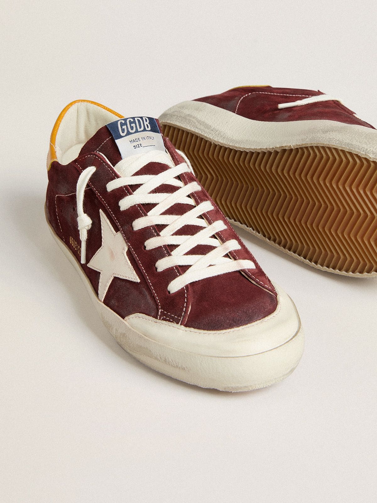 Men’s Super-Star in brick-red suede with white leather star and animal-print heel tab - Golden Goose Men