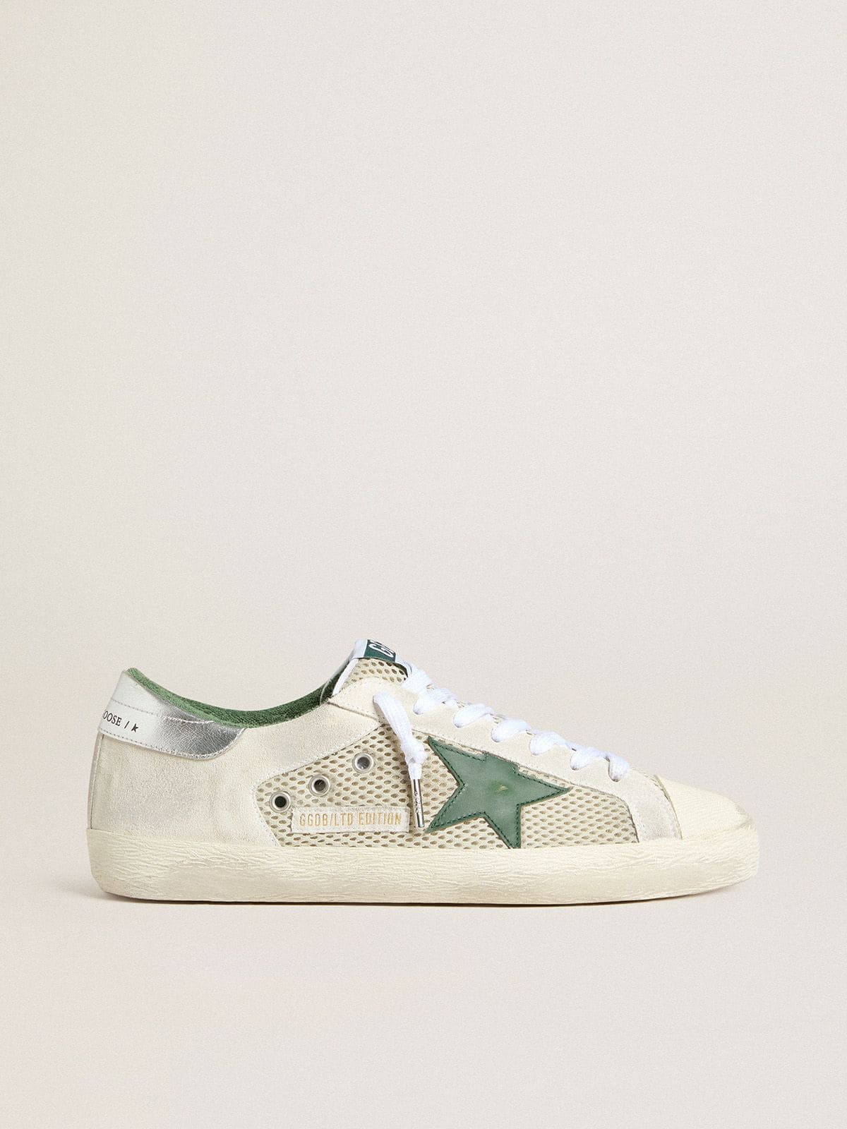 Men’s Super-Star LTD in white suede and mesh with green leather star and silver heel tab - Golden Goose Men