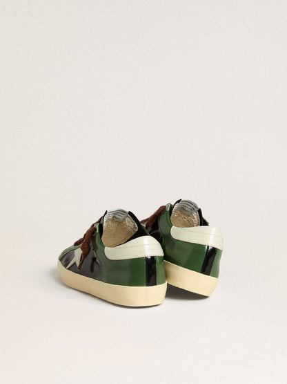 Men’s Super-Star LTD in black laminated leather with white leather star and heel tab - Golden Goose Men
