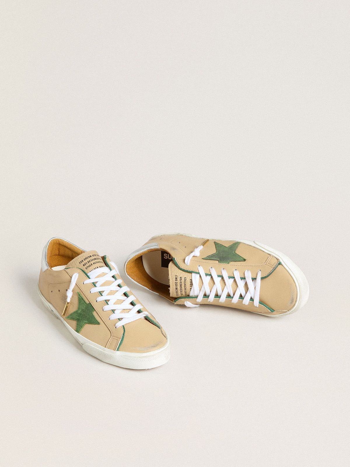 Super-Star LTD in beige leather with green suede star and silver foiled leather heel tab - Golden Goose Men