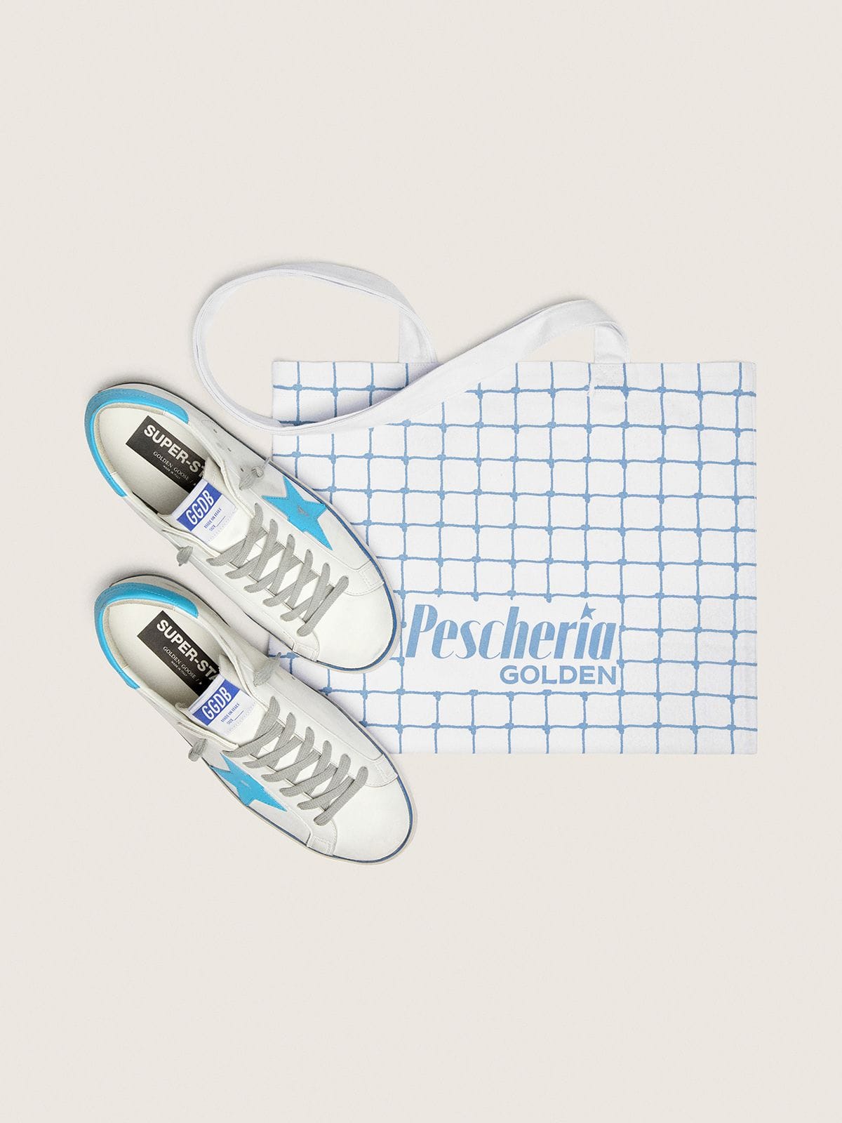 Men's Super-Star LTD in white leather with light blue leather star and heel tab - Golden Goose Men