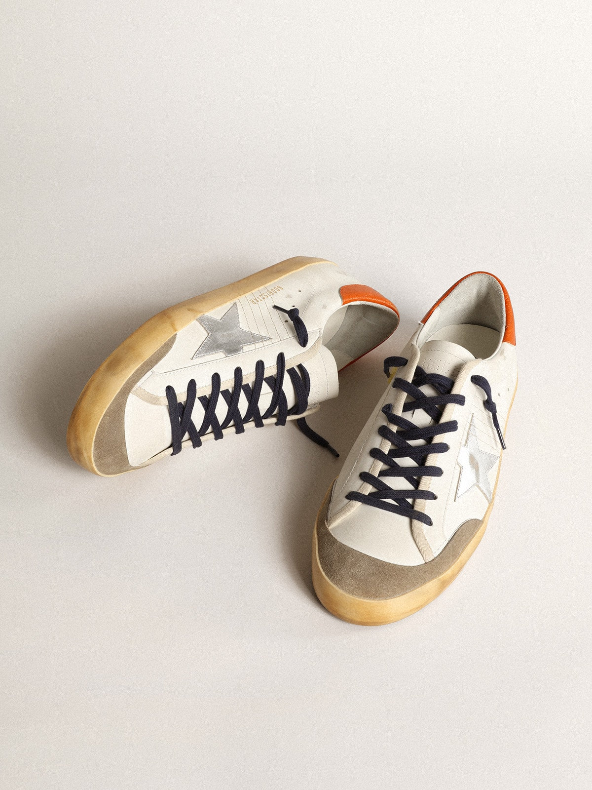 Super-Star Penstar with silver star and orange heel tab - Golden Goose Men
