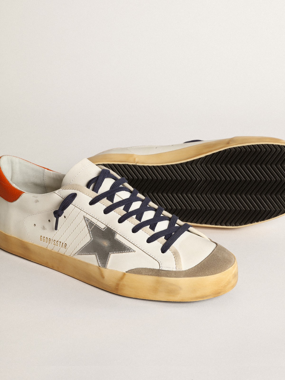 Super-Star Penstar with silver star and orange heel tab - Golden Goose Men