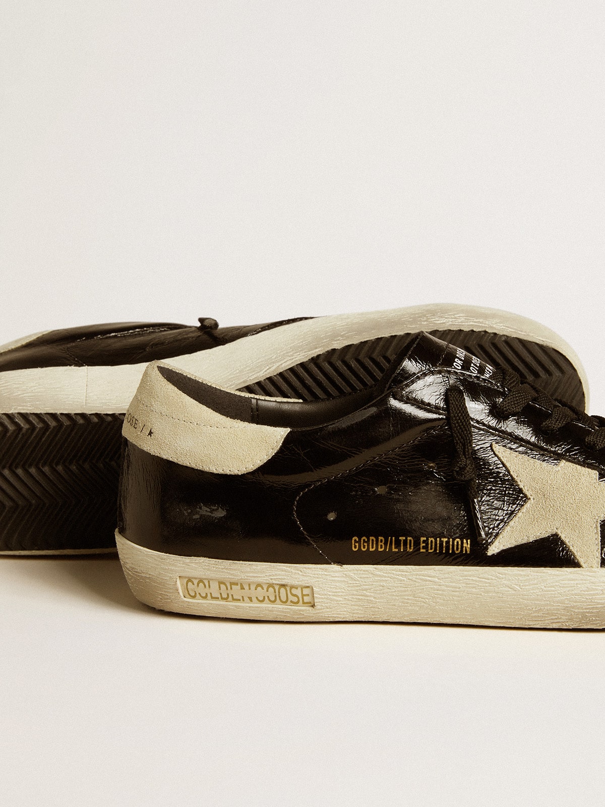 Men's Super-Star  in black patent leather with suede star and heel tab - Golden Goose Men