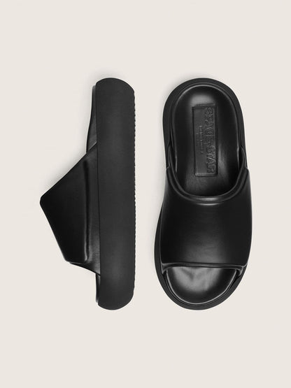 Men's Space-Star slip-ons in black leather - Golden Goose Men