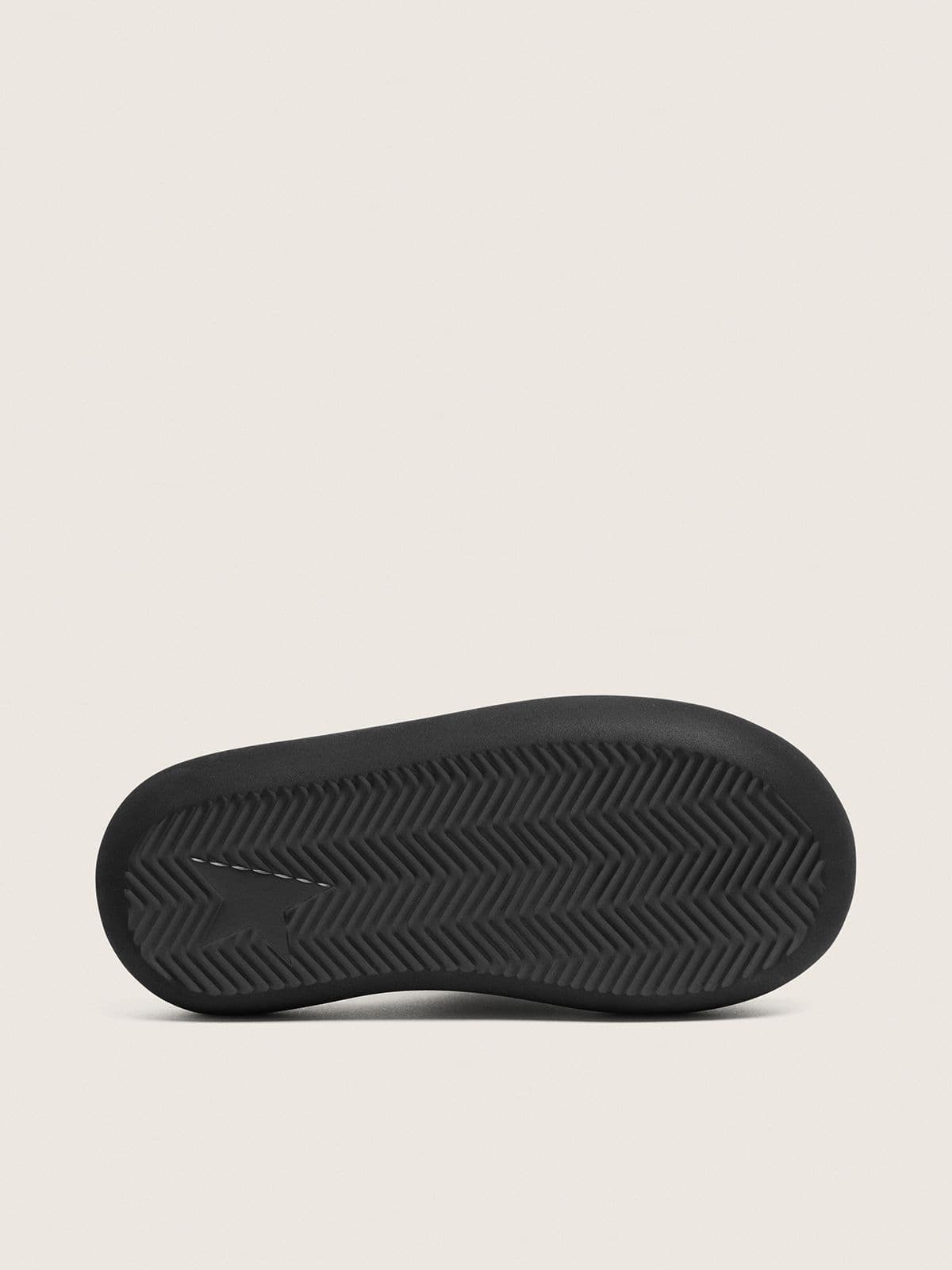 Men's Space-Star slip-ons in black leather - Golden Goose Men