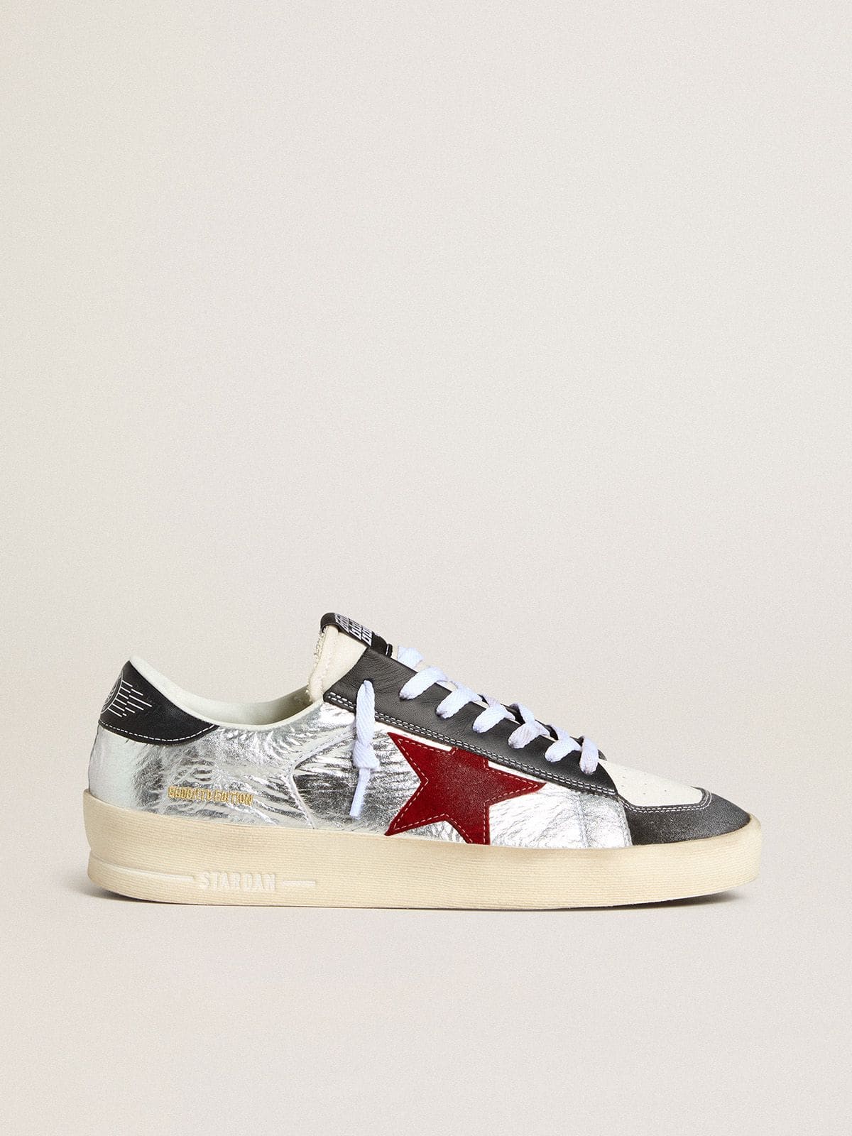 Men’s Stardan in laminated silver nylon with burgundy suede star - Golden Goose Men