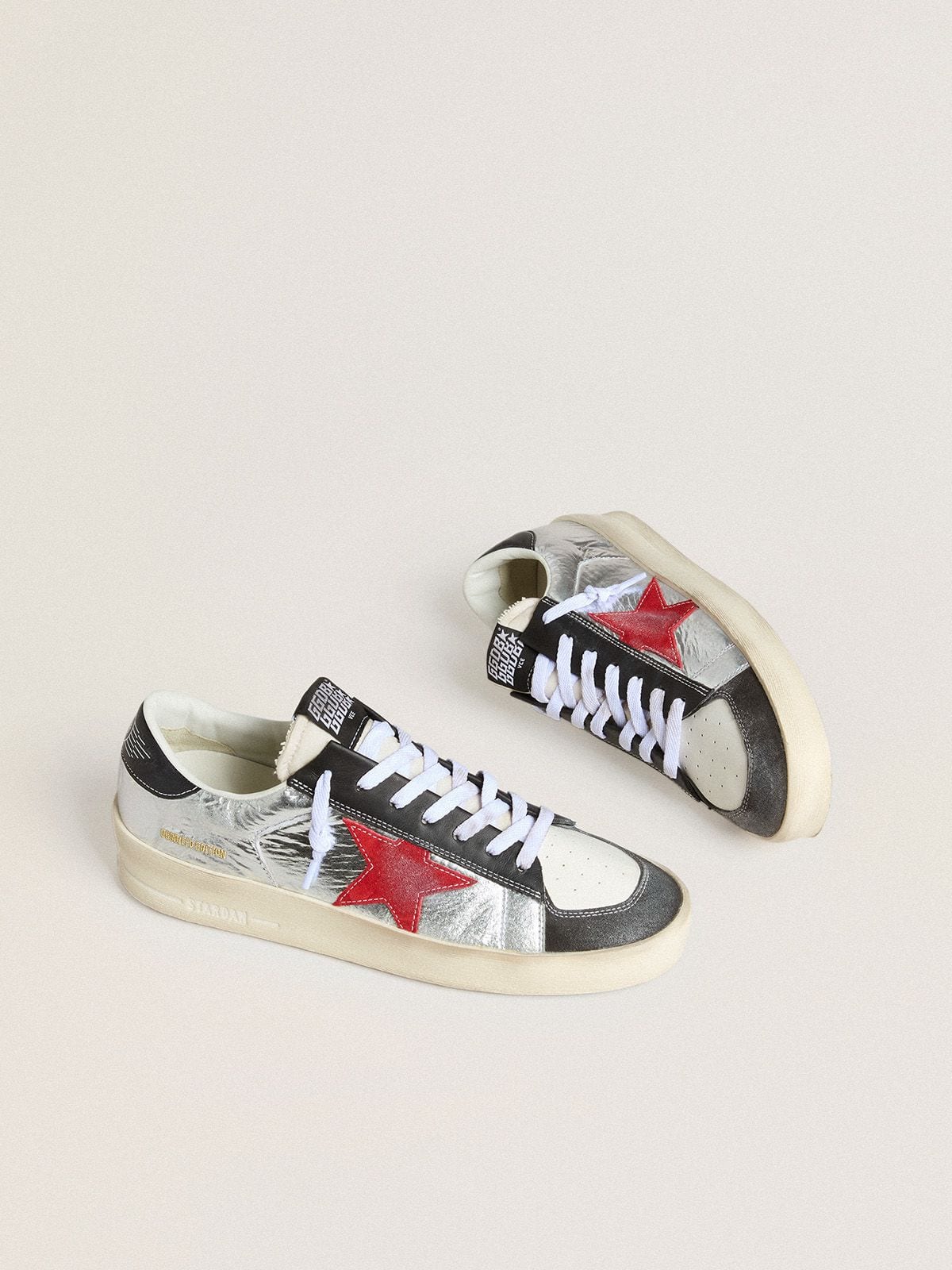 Men’s Stardan in laminated silver nylon with burgundy suede star - Golden Goose Men