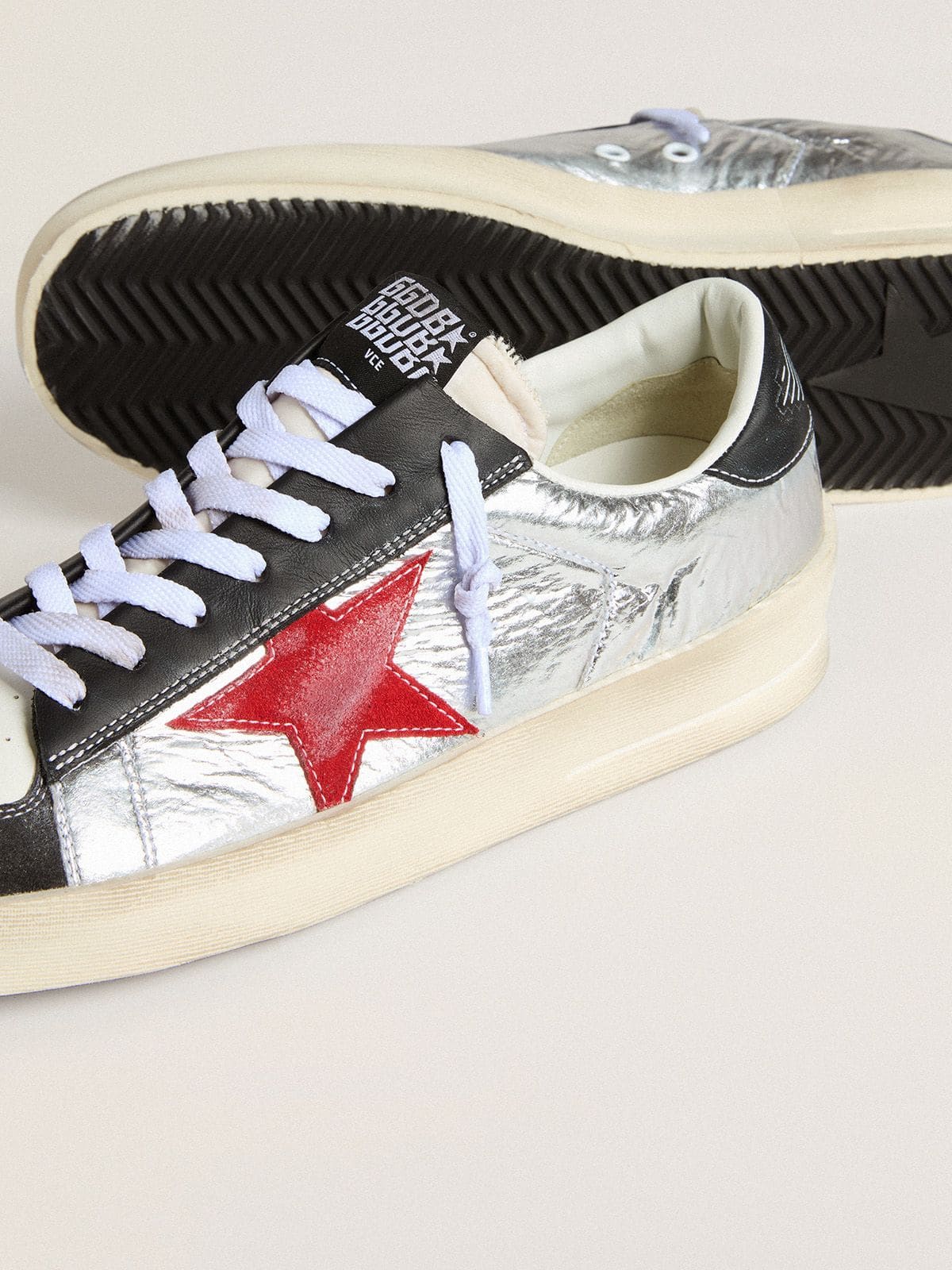 Men’s Stardan in laminated silver nylon with burgundy suede star - Golden Goose Men
