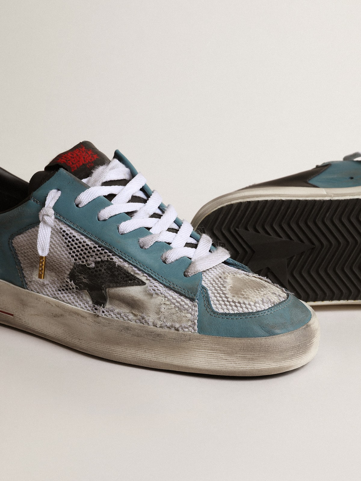 Men's Stardan in distressed mesh and petrol-colored upper - Golden Goose Men