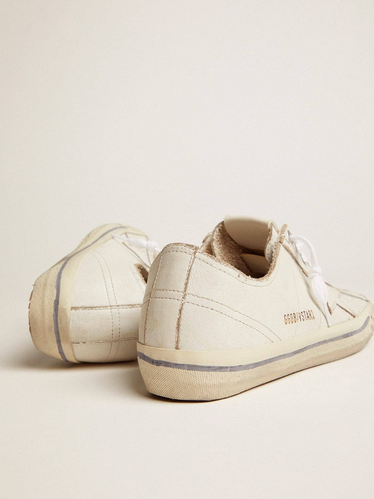 Men's V-Star in white leather with white star and light blue stripe on the foxing - Golden Goose Men