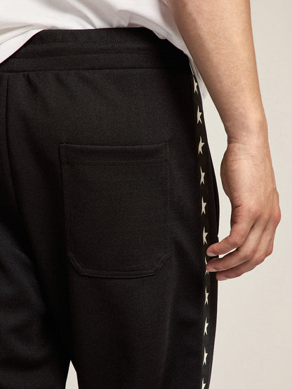 Men's black joggers with white stars on the sides - Golden Goose Men