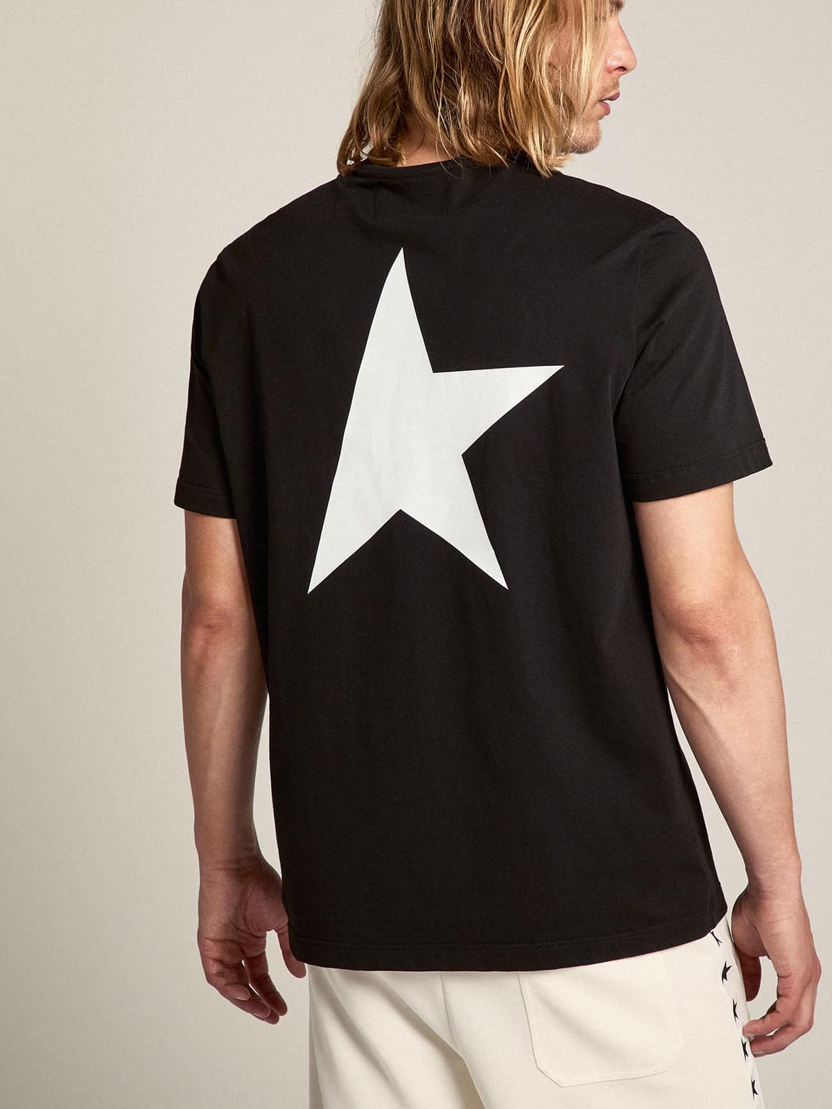 Men's black T-shirt with contrasting white logo and star - Golden Goose Men