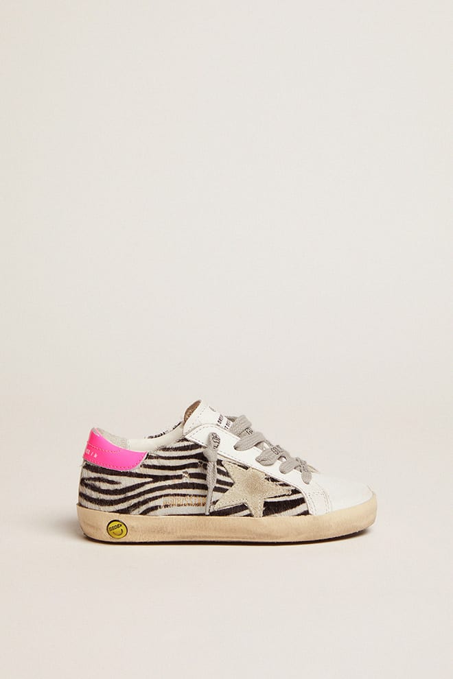 Junior Super-Star in leather and zebra-print pony skin with fuchsia heel tab - Golden Goose Kids