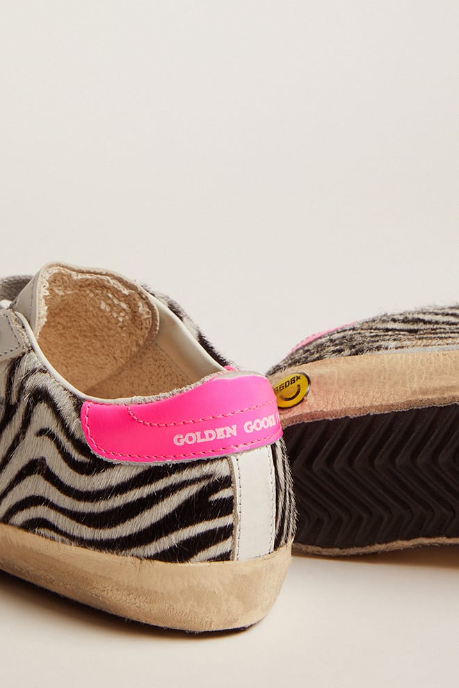 Junior Super-Star in leather and zebra-print pony skin with fuchsia heel tab - Golden Goose Kids