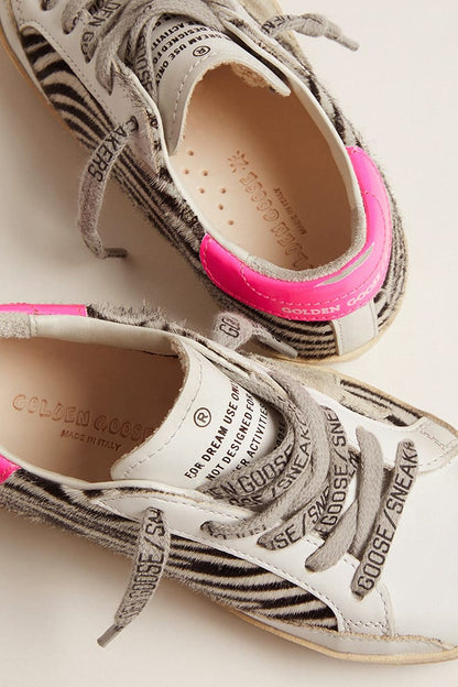 Junior Super-Star in leather and zebra-print pony skin with fuchsia heel tab - Golden Goose Kids