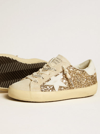 Super-Star Junior in gold glitter with white leather star and heel tab - Golden Goose Kids